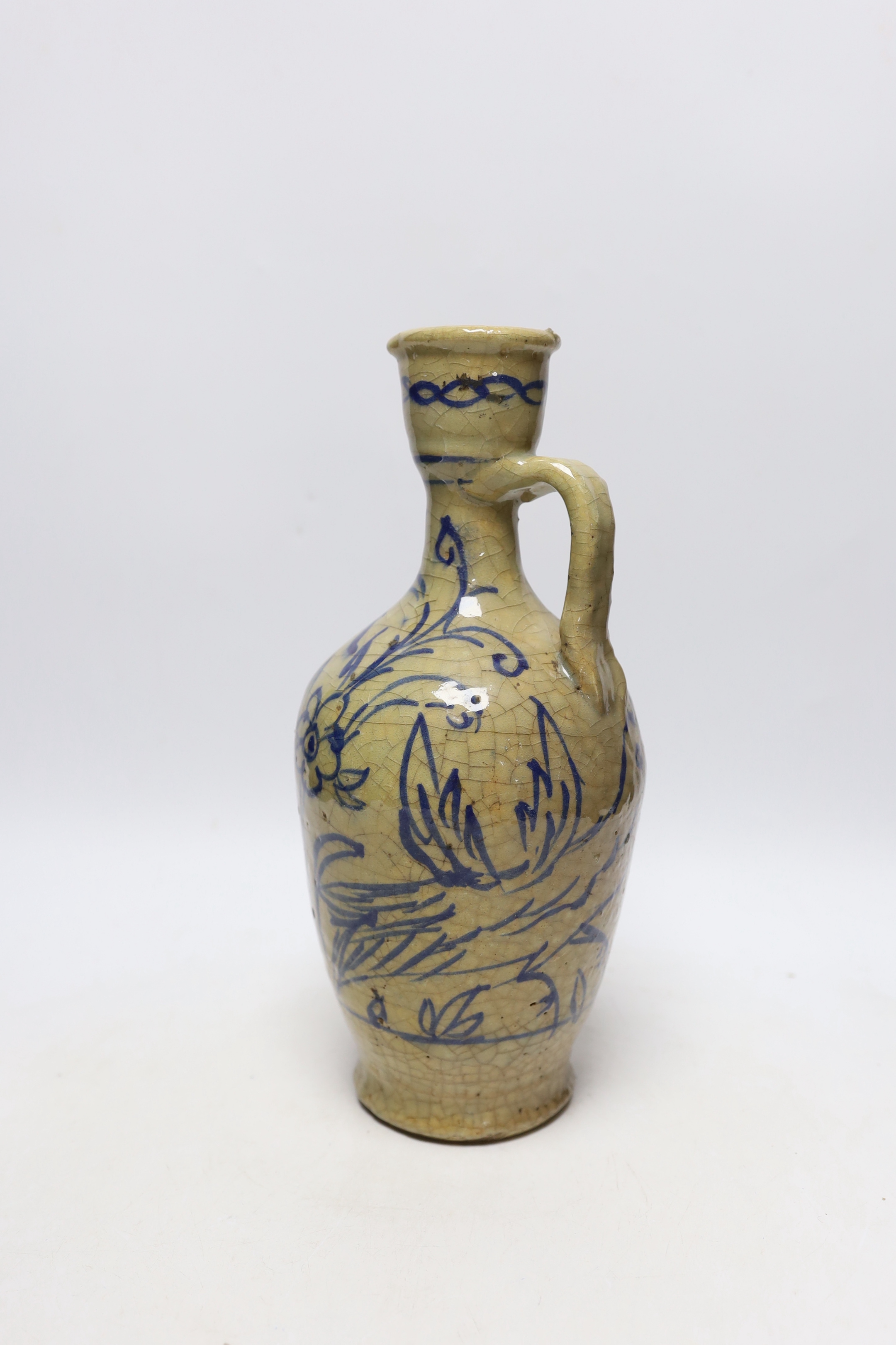 A Qajar dynasty fritware ewer, 31cm